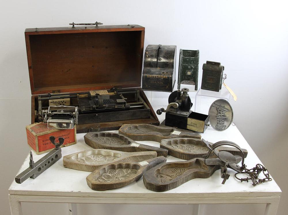 Old Printing Machine, Banks and Molds: Box of items to incude an old printing machine, two old banks and some old molds. Provenance: From a Burlington, Massachusetts estate.