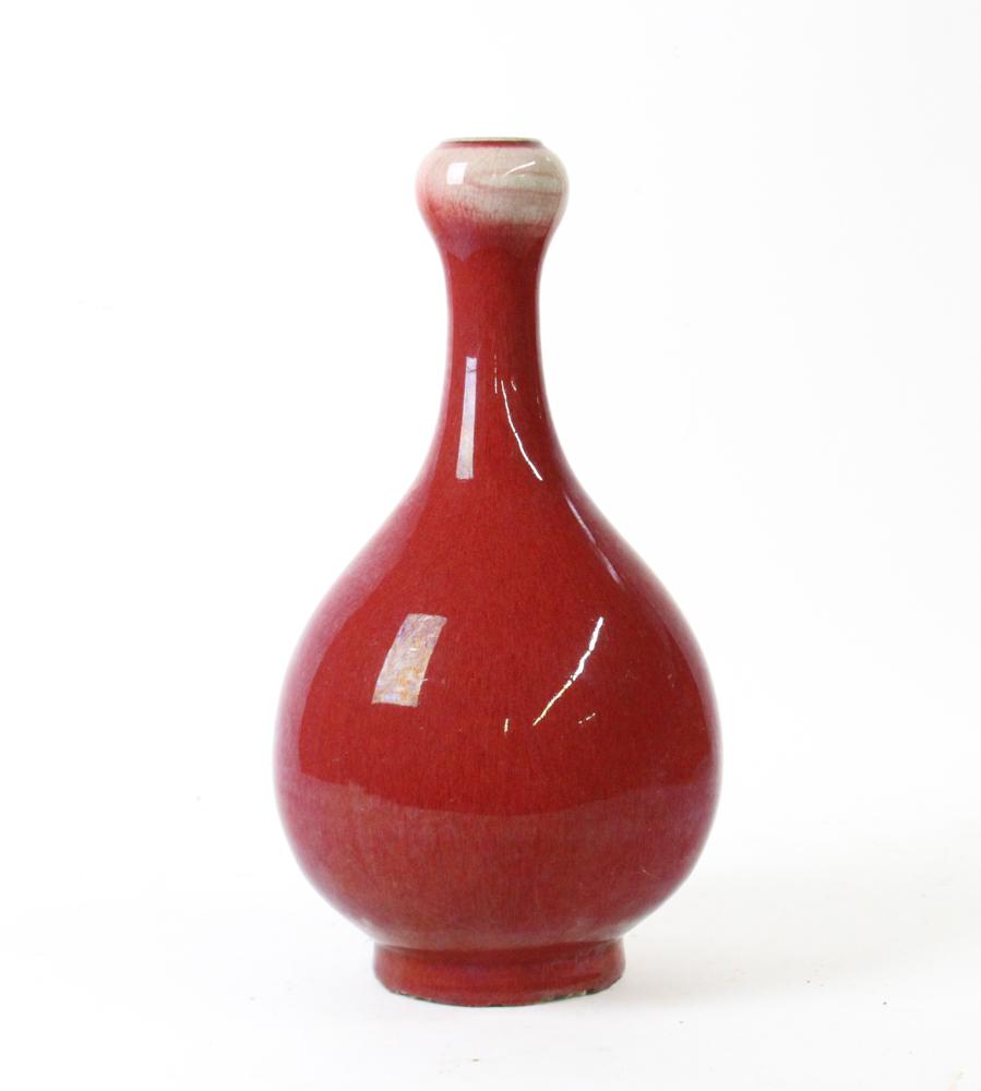Chinese Ox Blood Red Vase: Chinese Ox-blood red porcelain vase, in garlic-head shaped, 14 1/2" H.