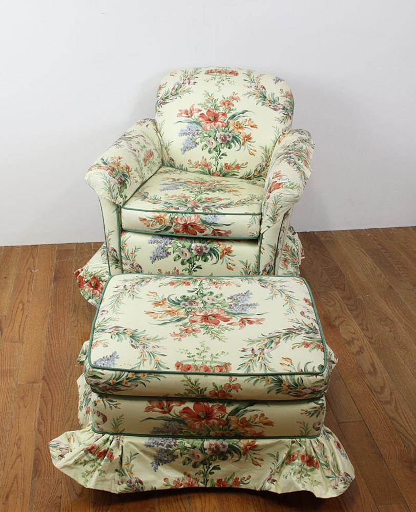 Chintz Upholstered Armchair and Ottoman: Chintz upholstered armchair, floral design, with ottoman, 32" H x 29" W x 28" D.