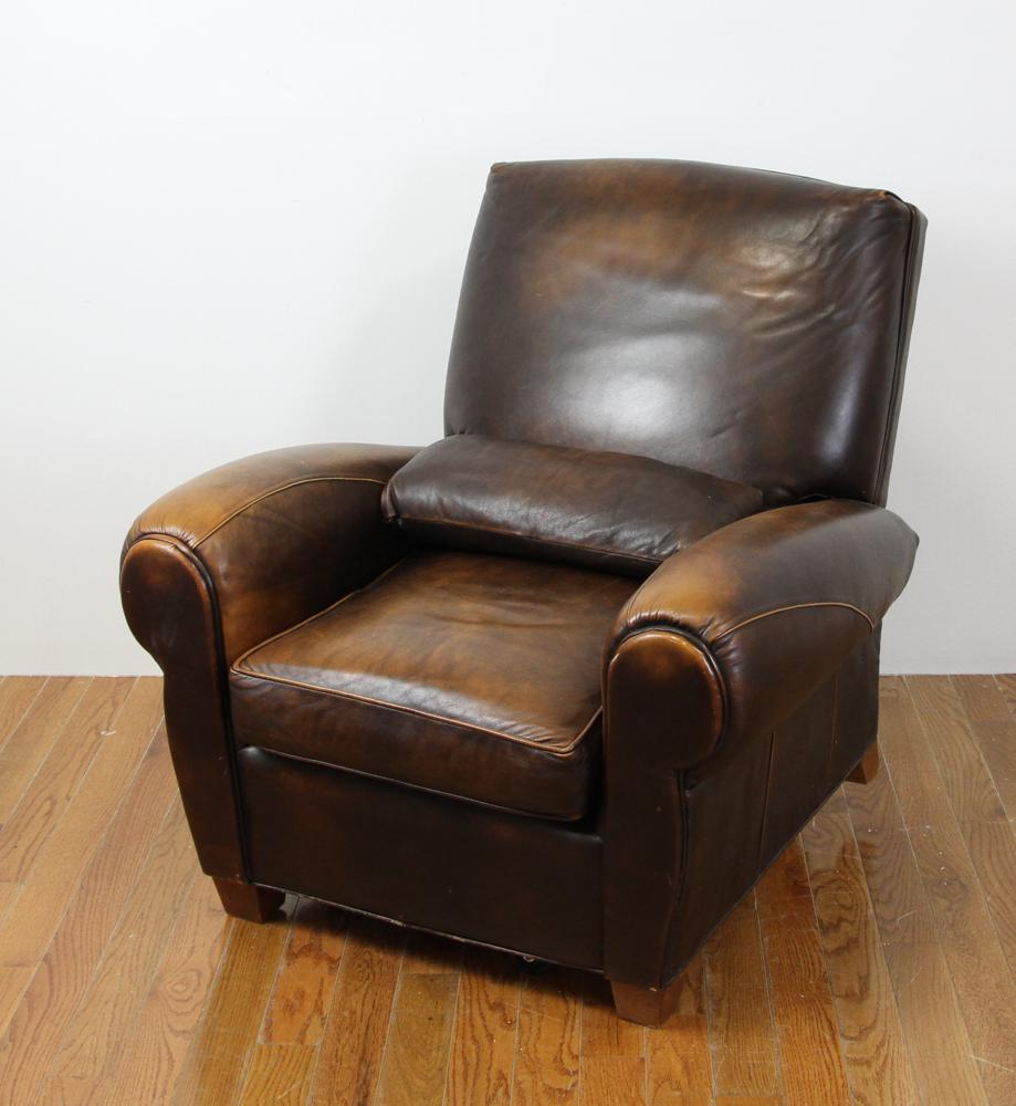 English Style Leather Reclining Chair: English-style leather reclining chair, 36" H x 40" L x 38" W. Provenance: From a Wantagh, New York estate.
