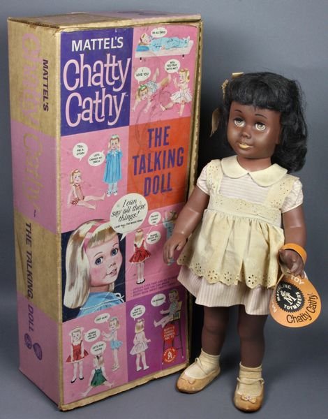 Mattel's 19" Chatty Catch Black Doll, Wrist Tag: Mattel's 19" Chatty Cathy Black version with wrist tag, unplayed with, talks, has box but doll dusty, never combed hair, clothing yellowed with tags, lip paint turned tan, some stains on box, marked "