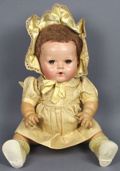 Effanbee 15" Dy-Dee-Baby Doll w/ Caracul Wig: Effanbee 15" Dy-Dee Baby, hard plastic head with rubber ears and body, head excellent paint and caracul wig excellent, rubber body excellent, all original clothes including bonnet, socks, shoes. Marke