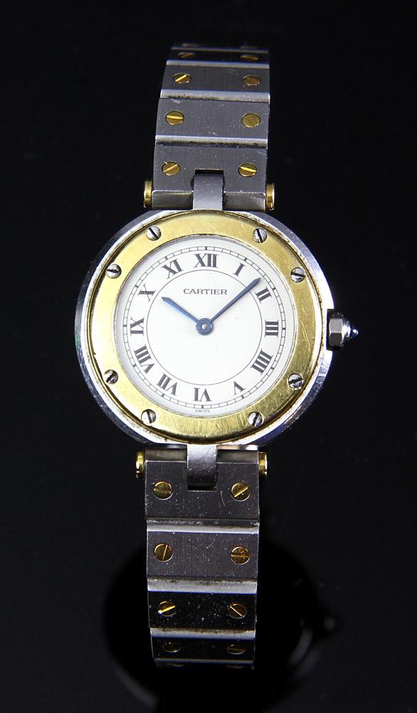 Ladies Cartier Santos Ronde Wristwatch: Ladies' Cartier 'Santos Ronde' two-tone wristwatch, gold and stainless quartz. PLEASE NOTE: payment for silver, gold, jewelry, and coins must be made via PayPal, cash, or bank wire transfer ONLY.