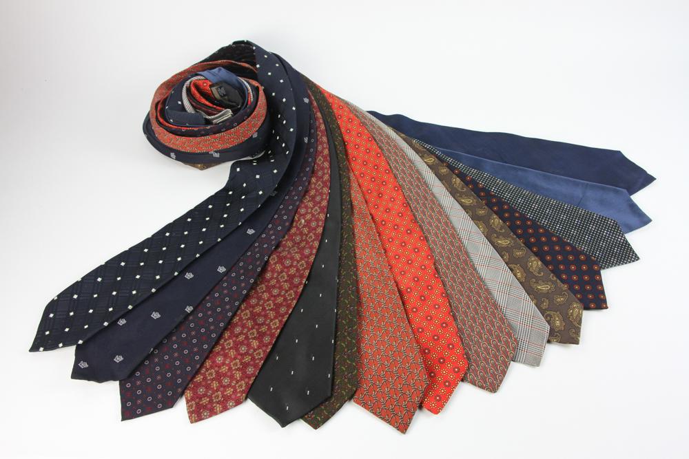 Group of Mens Ties: Group of men's ties, to include: Piccione, Ferre, Hermes, Canali, Brioni, Christian Dior, and other makers, fifteen (15) total. Provenance: From a Fitchburg, Massachusetts estate.