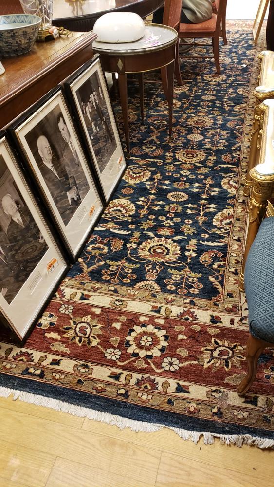 Large oriental carpet with moth damage (1 of 1)