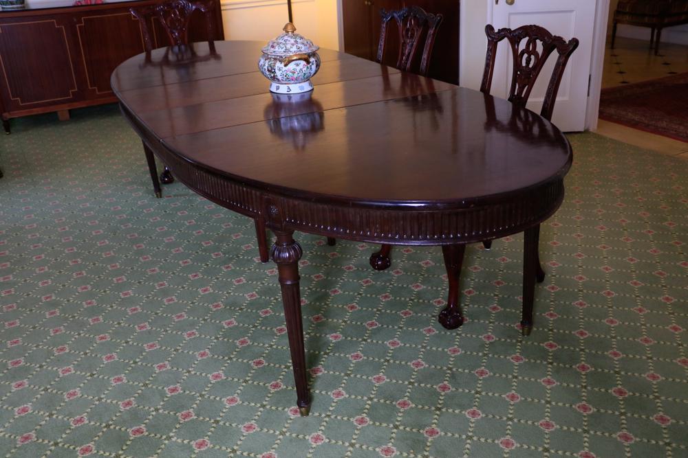 French regency style oval mahogany dining table: Herbert Hoover Suite: French regency style oval mahogany dining table including two leaves, circa 1920s