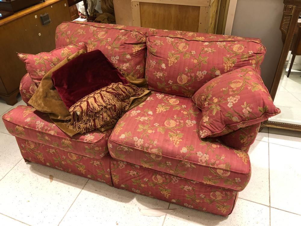Red floral upholstered sofa and loveseat. (1 of 1)