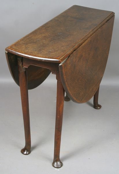 18th C. English Queen Anne Oak Drop-leaf Table: 18th Century English oak drop leaf Queen Anne table, 28 1/2"h. x 43" x 36". Age wear, good condition.
