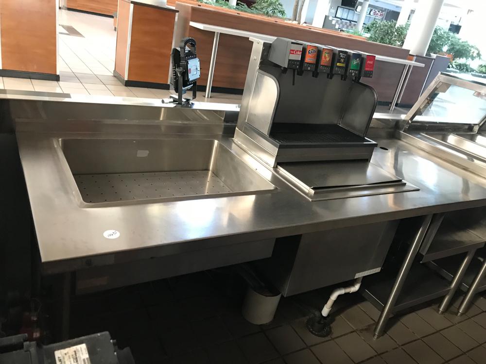 Stainless Steel Counter Cabinet with Sink: Stainless steel counter with sink, includes soda fountain, 32" H x 84" W x 32" D. Comes with concentrate and carbonation systems.