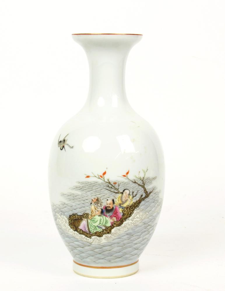 A Chinese Famille Rose Porcelain Vase: A porcelain vase decorated with Chinese eight immortals sailed across the sea, and a poem. Six-characters Qianlong seal mark on base. 8 3/4" H.