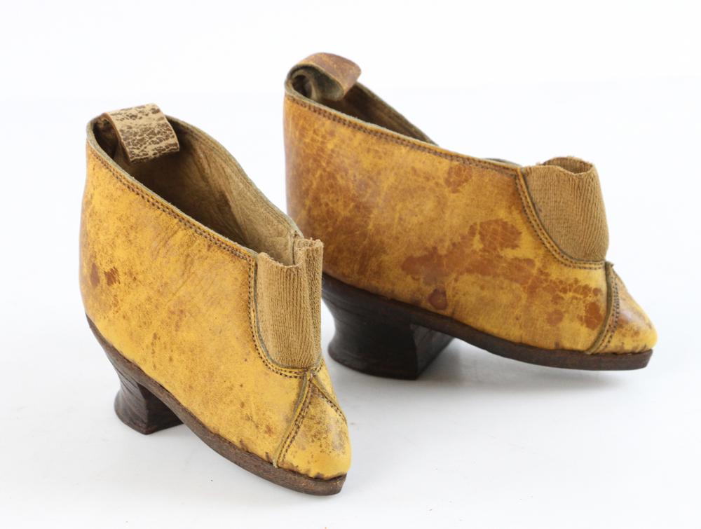 Rare Pair of Circa 1920 Chinese Pigskin Shoes: Rare pair of pigskin shoes with wooden heels, likely Shanghai circa 1920, pictured on page 47 of 'Splendid Slippers' by Beverley Jackson, 4 1/2" long. Provenance: From the collection of the late Bever