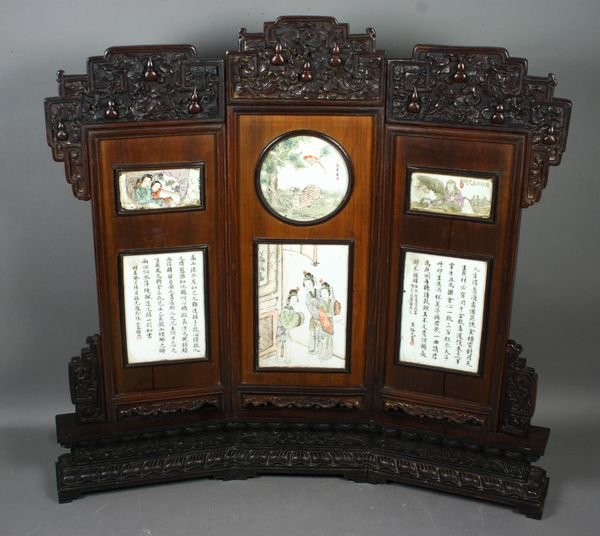 19th C. Chinese Sandelwood Porcelain Screen: 19th Century Chinese carved sandelwood and porcelain panel screen, 25" x 28", panels signed (quotations) mountains, birds, water.