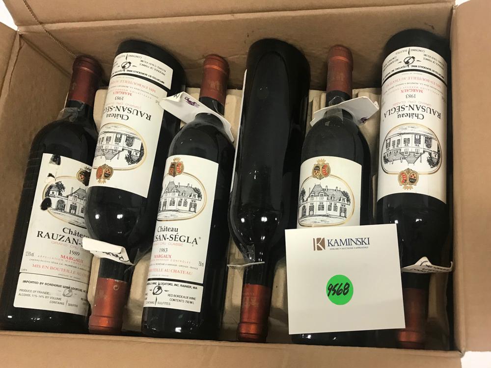 Box of (12) Bottles of Wine: Box of wine, to include: 1983 Chateau Rausan-Segla, (11) bottles; 1989 Chateau Rausan-Segla, (1) bottle; (12) bottles total. Provenance: From a Los Angeles, California estate.