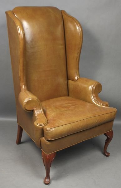 Early 20th C. QA-style Wing Chair w/ Leather: Early 20th Century Queen Anne-style wing chair with brown leather upholstery, 50 1/2"h. x 32 1/2"w. x 30"d.