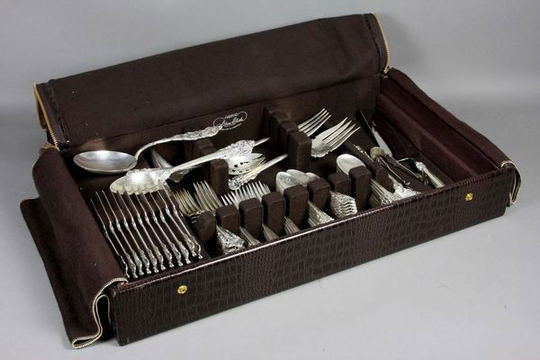 Wallace "Grande Baroque" Sterling Flatware: Wallace Silversmiths "Grande Baroque" sterling silver flatware service for (12), with additions, to include: (12) dinner knives with stainless blades; (12) butter spreaders; (12) dinner forks; (12) sa