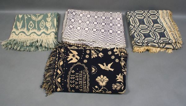 (2) 19th Century Coverlets, plus (2) others: Two (2) 19th Century blue and white coverlets, one dated 1833, jacquard, 92" x 71", one knitted, wedding ring pattern, 86" x 72", with old repairs and fringe damage; plus (2) others, one green and whi