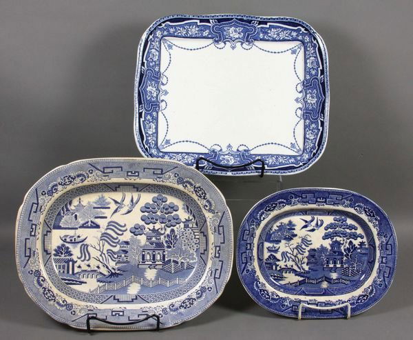 Three 19th C. Transfer Platters "Blue Willow", Un: Group of three (3) 19th Century transfer platters to include "Blue Willow", 10 3/4" x 9 1/2", good condition; unidentified pattern, 14 7/8" x 12 1/2", good condition; "Blue Willow", 15 1/4" x 12 1/4",