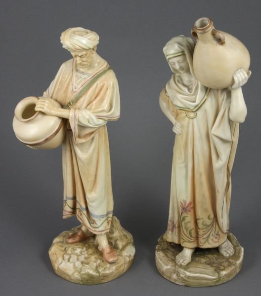Pair of 19th C. Royal Worcester Parian Figures: Pair of 19th Century Royal Worcester glazed parian figures titled "Cairo Water Carriers", 9 3/4"h., Worcester dated 1885, with fine floral and gilt decoration. Both in good condition.