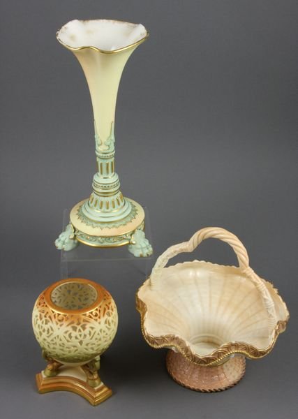 (3) pcs 19th Century Royal Worcester Porcelain: Three (3) pieces of late 19th Century Royal Worcester porcelain, to include blush-colored basket, dated 1885, 7"h.; vase with lion paw foot, dated 1895, 9"h.; reticulated potpourri holder, 4 1/2"h. Al