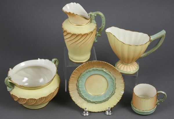 (4) Pieces of 19th C. Royal Worcester Porcelain: Four (4) pieces of late 19th Century Royal Worcester porcelain to include cream and sugar, creamer 5"h., sugar 5 1/4" handle-to-handle; demitasse cup and saucer; individual creamer. Cup and saucer bot