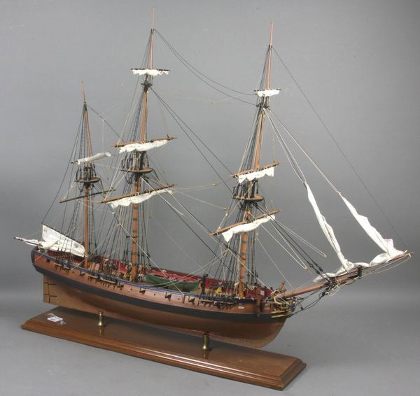 Fine Scale Model of Privateer "Rattlesnake": Fine scale model of the American privateer Rattlesnake. Planked hull above the waterline, copper sheathed below. Rigged with standing and running cords and furled sails. Planked and pinned deck. 34" l