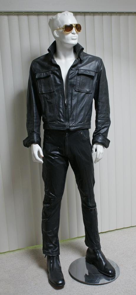 Elvis Leather Suit Set and Sunglasses on Mannequin: An Elvis leather jacket, pants and shoes, with mannequin and sunglasses. Provenance: Collection of Elvis Presley honeymoon home contents.