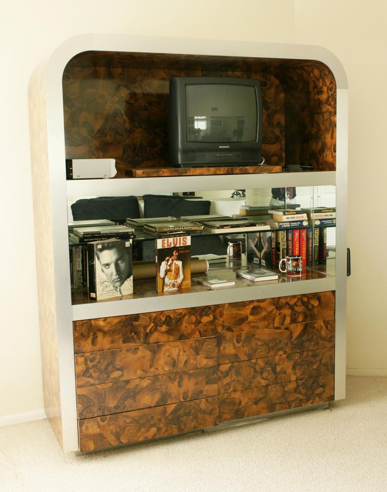 Vintage Faux Tortoise Shell Cabinet: Vintage faux tortoise shell cabinet with rounded edge top, eight drawers, and mirrored midsection. Provenance: Collection of Elvis Presley honeymoon home contents.