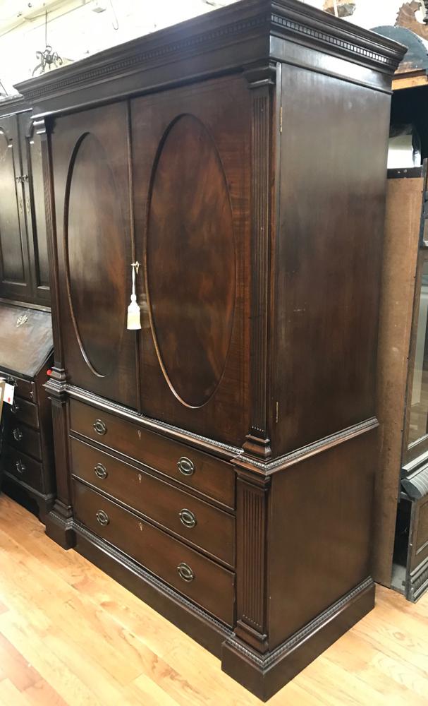 Antique English Regency Two Door Linen Press: Antique English Regency mahogany two door linen press, banding inlaid with bone escutcheons, original cost $7,420, 82" H x 57" W x 25 1/2" D.