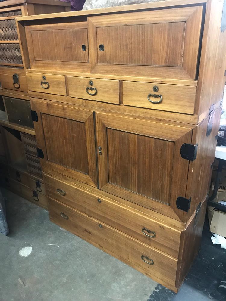 Early 20thC Japanese Tansu Cabinet: Early 20th century Japanese Tansu cabinet, with two sliding drawers above, three drawers above, and two lower doors with slide out drawers, no key. Provenance: From a Westwood, Massachusetts estate.