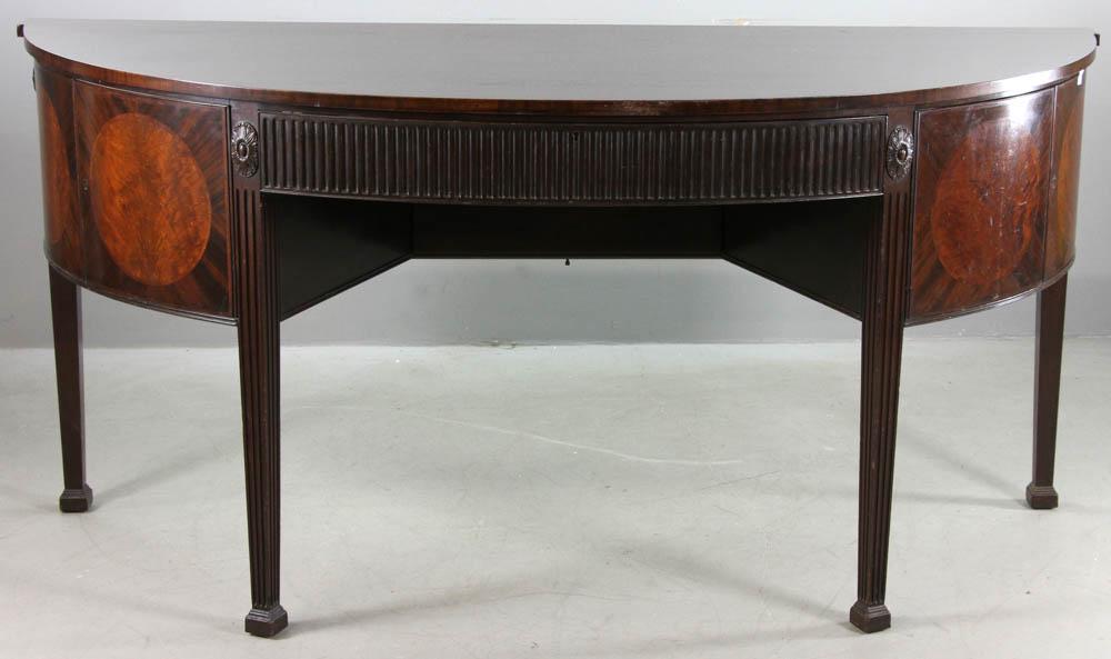 Regency Style Mahogany D Shaped Sideboard: Regency-style inlaid and carved mahogany D-shaped sideboard with felt-lined silver drawer, circa 1900, 36" H x 75" W x 26" D.