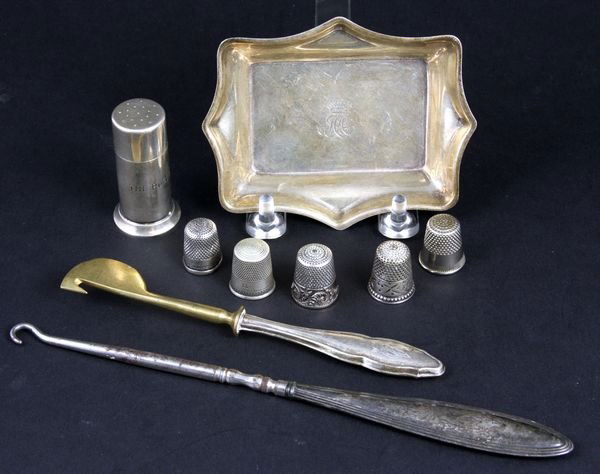 Sterling Sewing Accessories, one Tiffany & Co.: Collection of sterling silver sewing accessories, including: pin canister marked Tiffany & Co. Makers, 2"h.; (4) thimbles; pin tray marked Asprey & Co. on base 4"w.; (2) crochet hooks. 3.9 ozt total w