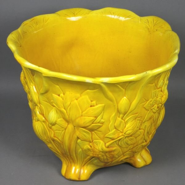 19th Century Mintons Majolica Jardiniere: 19th C. Mintons majolica jardiniere in yellow bottom, marked #198 Mintons England, 8 1/2"h.x 11 1/4"d. Good condition.