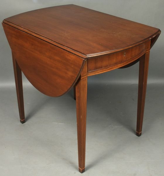 20th C. Kittinger Mahogany Drop-Leaf Table: 20th Century Kittinger mahogany single-drawer drop-leaf table with string inlay, 29"h. x 22 1/2"w. (closed), 47"w. (open) x 33"d. Inlay loss at end of legs.