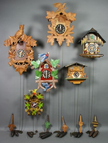 (6) 20th C. German 1-Day Cuckoo Clocks: Group of six (6) 20th Century German 1-day cuckoo clocks, largest 15"h. x 11"w. x 6 1/2"d.