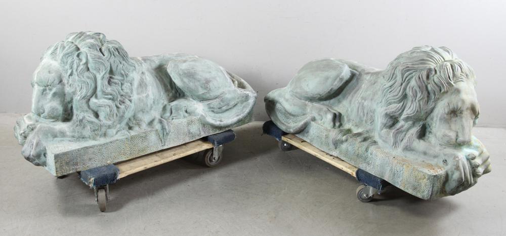 Pair of Reclining Bronze Lions: Pair of reclining bronze lions, 22" x 45 x 17".