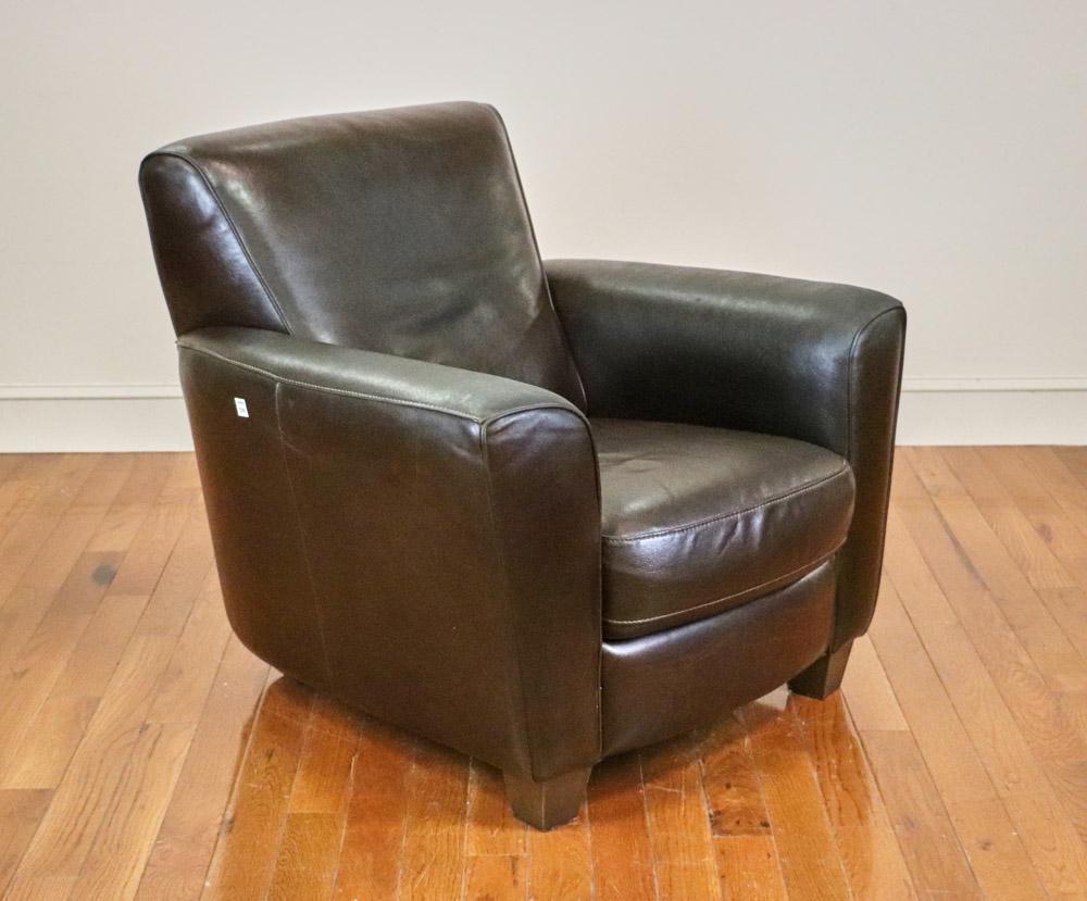 Leather Upholstered Armchair: Leather upholstered armchair, 34" H x 35" W x 34" D.