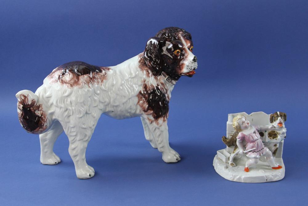 English Staffordshire Dog: Antique English Staffordshire Saint Bernard dog with matchstick holder Provenance: Amherst, NH.