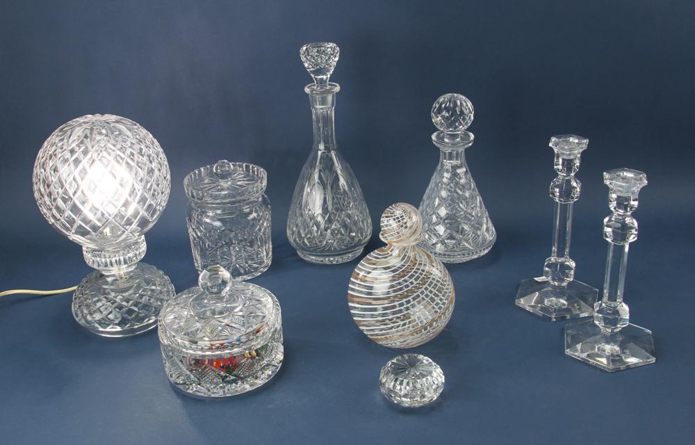 Assorted Glass Items, Waterford, Val Saint Lambert: Lot of (8) assorted glass items, to include: Waterford crystal decanters, lamp, dish and cracker jar, Val Saint Lambert candlesticks, and Venetian decanter. Provenance: Estate of Carol Z. Stone.