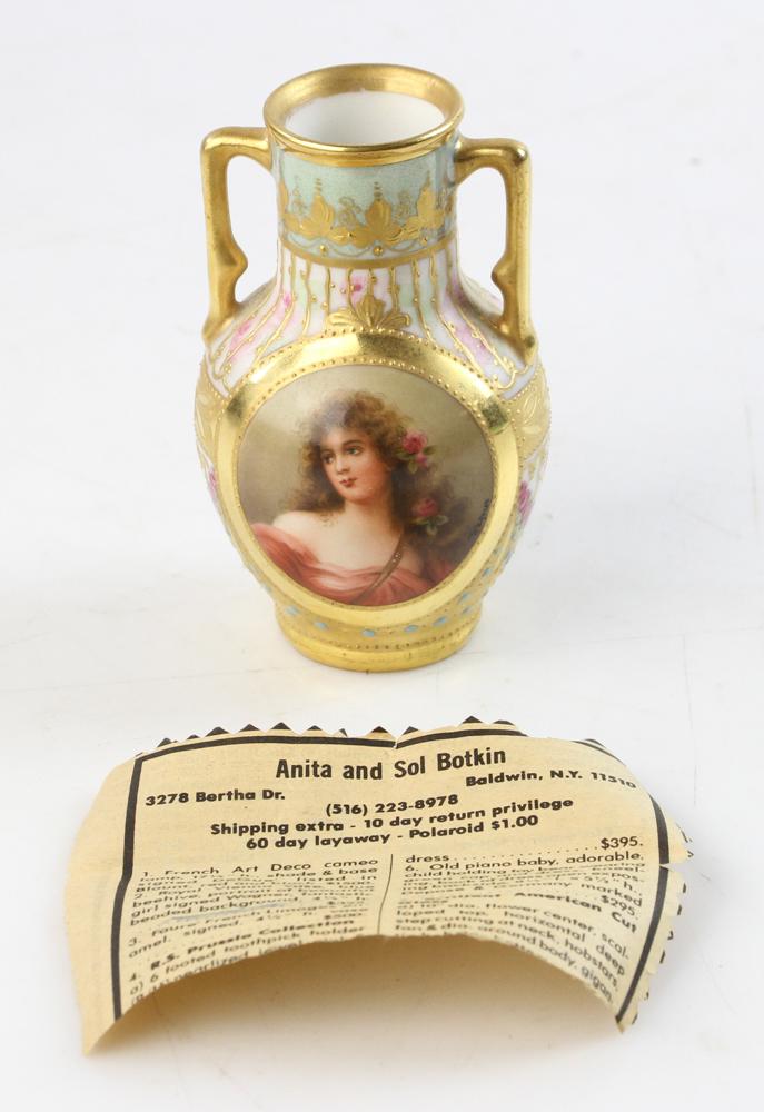 19th Century Royal Vienna Portrait Vase: Diminutive 19th century Royal Vienna hand-painted and jeweled portrait vase with lavish gilt embellishment, signed 'Wagner' within portrait cartouche, 3 5/8" H. Provenance: Estate of Norma Szaro, Swam