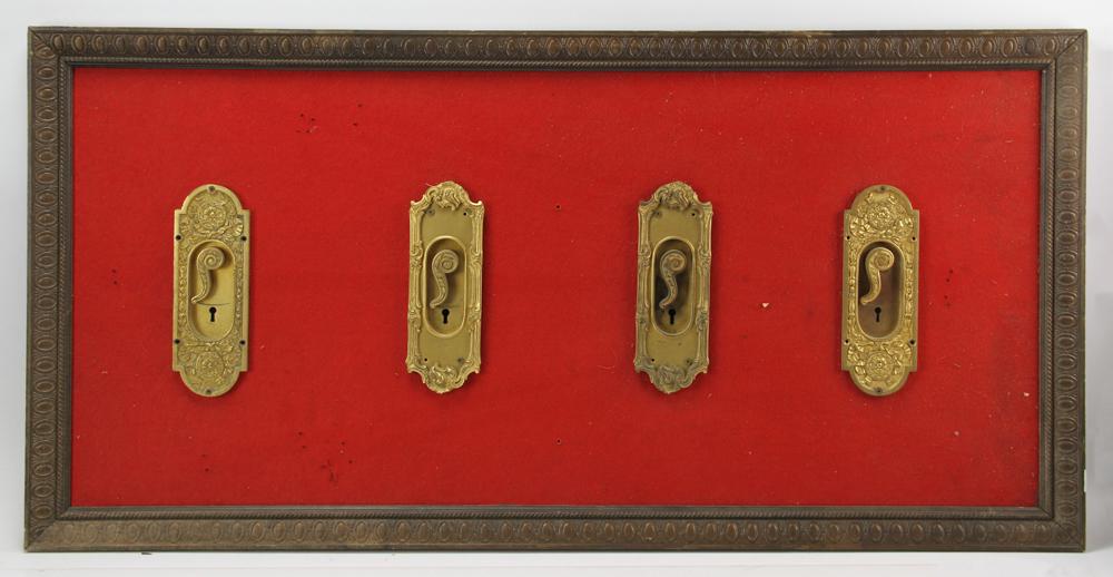Display Board of Gold Door Hardware: Display board of gold door hardware. Provenance: From the estate of Gregory and Katherine Sullivan of Dover, MA.
