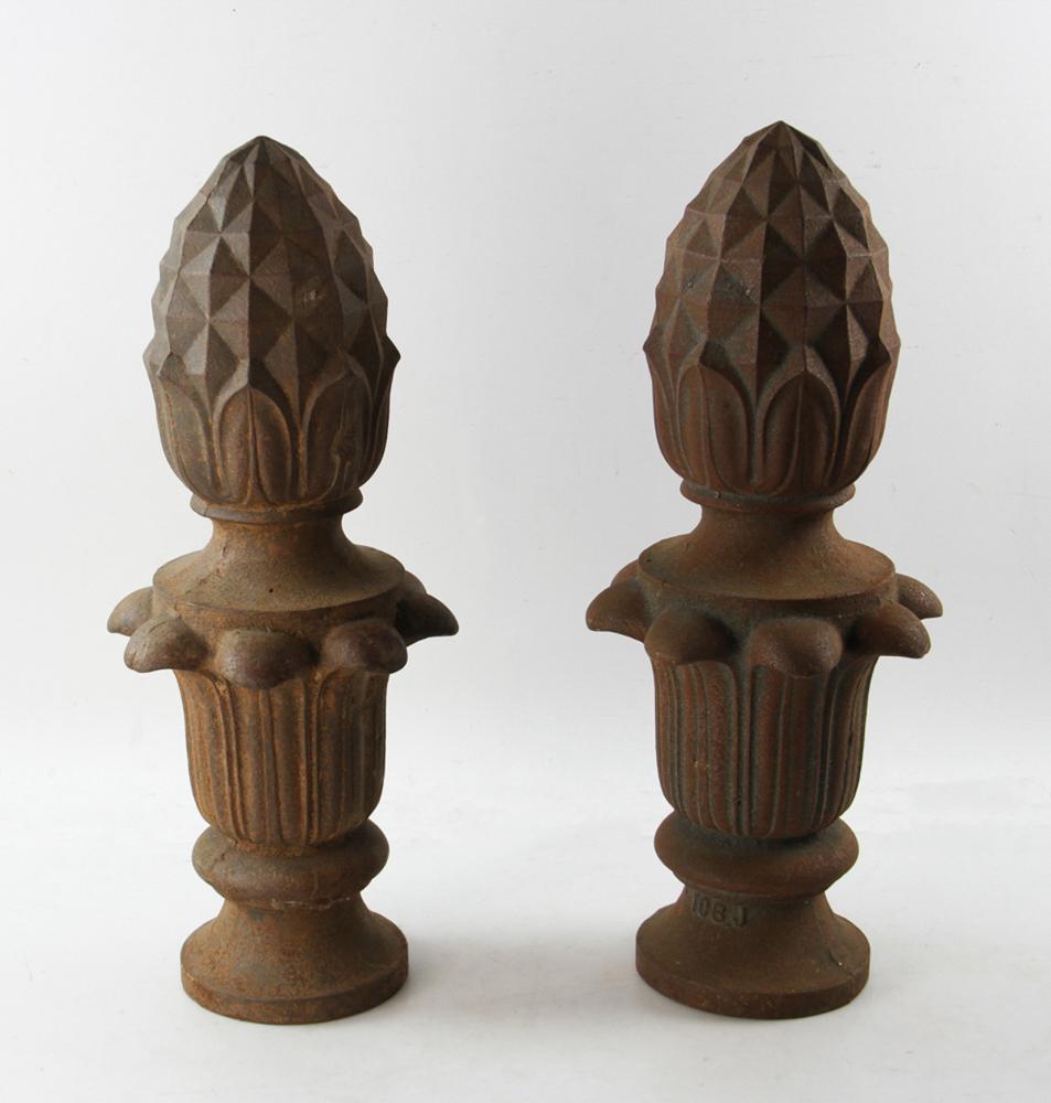 Pair of Cast Iron Finials: Pair of cast iron finials. Provenance: From the estate of Gregory and Katherine Sullivan of Dover, MA.