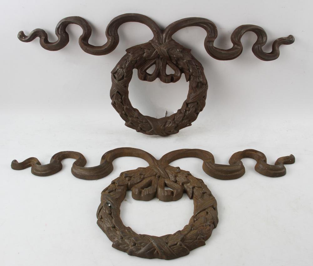 Two Cast Iron Wreaths: Two cast iron wreaths. Provenance: From the estate of Gregory and Katherine Sullivan of Dover, MA.