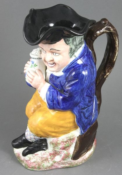 Early 19th C. English Staffordshire Toby Jug: Early 19th Century English Staffordshire Toby jug, 9 3/4"h. Good condition.