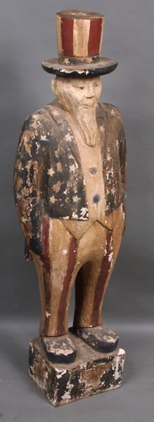 Old Folk Art Carved Painted Figure, Uncle Sam: Old Folk Art carved and painted wood figure of Uncle Sam, 49 3/4"h. Paint chips and chips to hat.