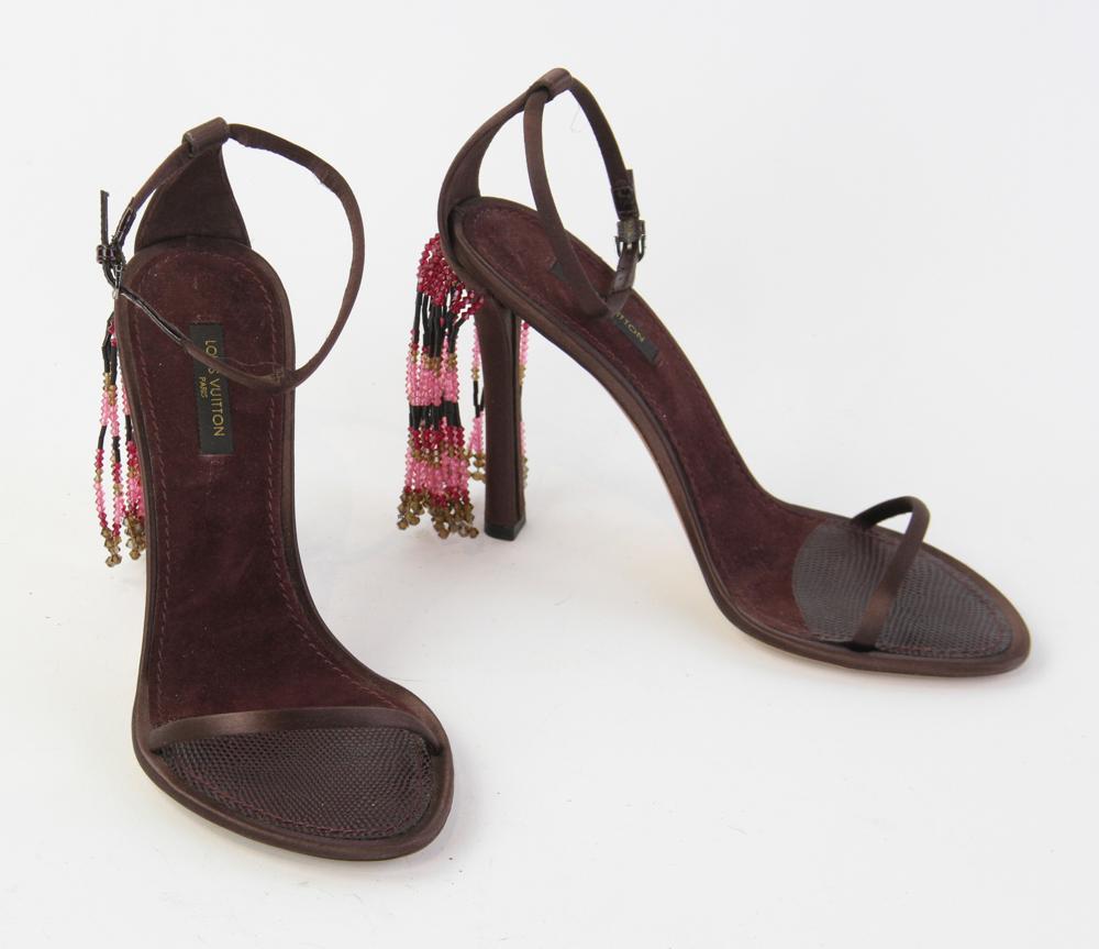 Louis Vuitton Maroon Silk Heels: Louis Vuitton maroon silk shoes with beaded heel. Size 37 1/2.
