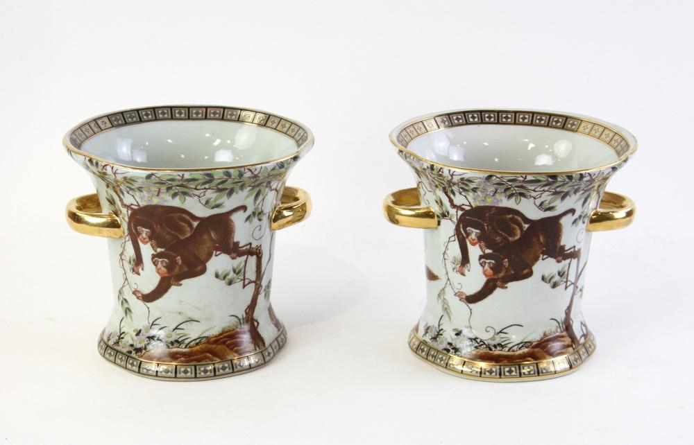 Pair of Monkey Decorated Cachepots: Pair of monkey-decorated cachepots, Chinese character mark on base, 7" x 7 1/2".
