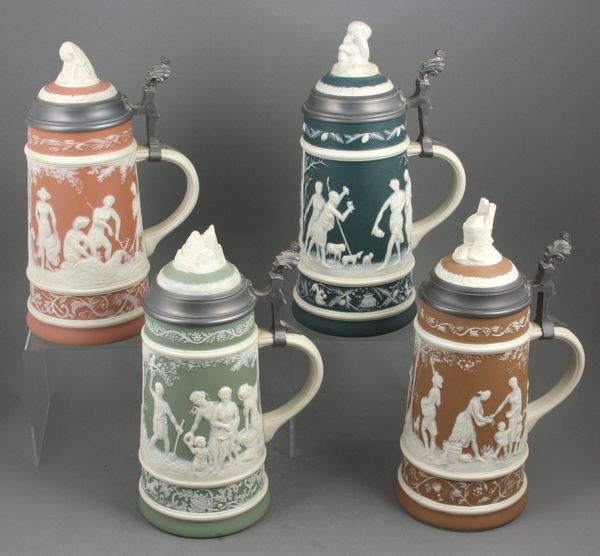 (4) Villeroy & Boch Mettlach Seasons Steins: Villeroy and Boch Mettlach four seasons steins, 10 1/2"h.
