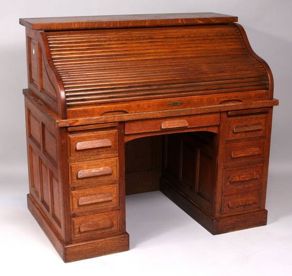 Great Roll-top Desk with Quarter Sawn Oak: Great roll-top desk having raised panels and quarter sawn oak, 45"h. x 50"w. x 30"d. Surface wear.