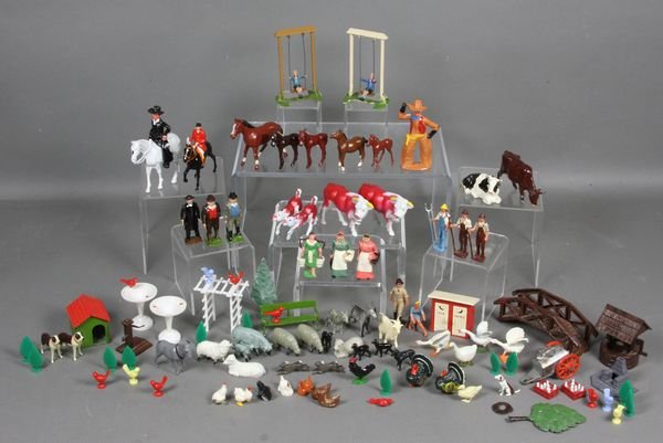 Lead and Plastic Miniature Toy Lot: Lead and plastic miniature toy lot, to include farm animals, fencing, buildings, military vehicles, lead figures, a set of "Britains Farm" in original box, and other "sets" in original boxes. Various 