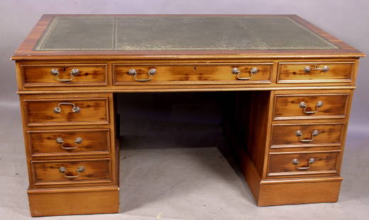 20TH CENTURY GEORGIAN-STYLE EXECUTIVE DESK: 20th Century Georgian-style executive desk with double bank of drawers, tooled leather top, 61 1/2"l. x 36"w. x 31"h. Good condition.